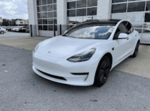 White Tesla With Window Tinting